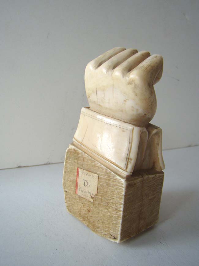 A fine and RARE carved Whale Tooth Paperweight in the form of a fist with cuff circa 1850 — image 3